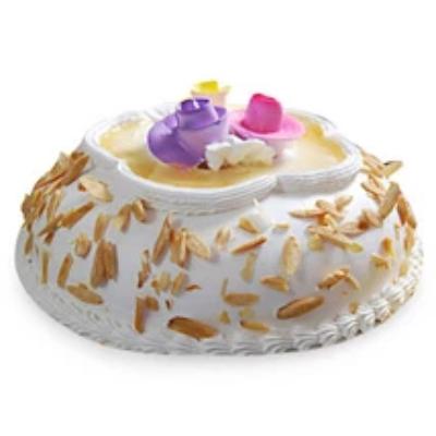 Almond Cake of round shaped with white color beautiful almond cake  - Expressluv.in