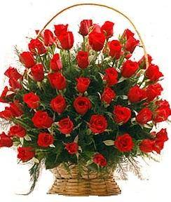 a beautiful round Basket full of red beautiful Roses to gift someone - Expressluv.in