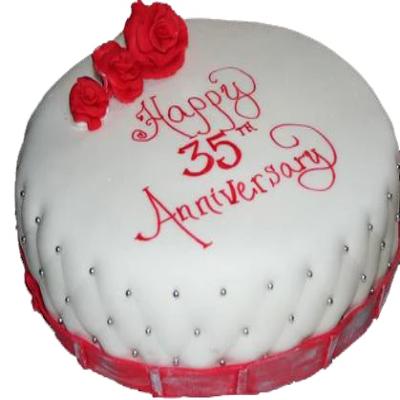 white colored round 35th wedding anniversary cake with red roses on the top, white and red colored round wedding anniversary cake online delivery, order online in India, send gifts to India