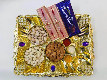 dry fruit rakhi with dairy milk and chandan tray